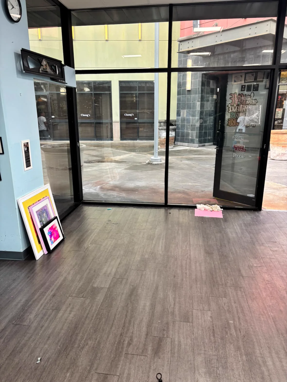 Cleared commercial entry and open floor after the cleanout